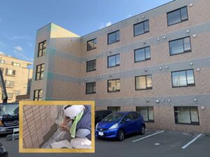 リフォーム後：外壁タイル補修で明るくなったマンション外観全景